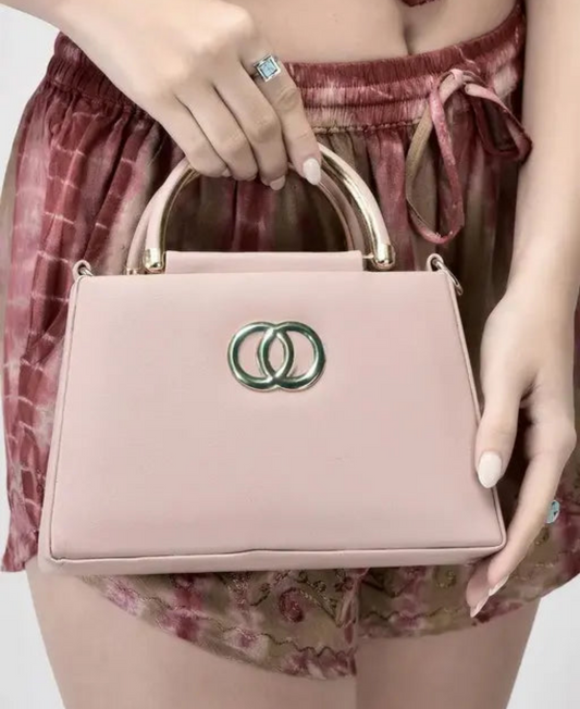 Designer Handbag with Gold Accents and Detachable Strap